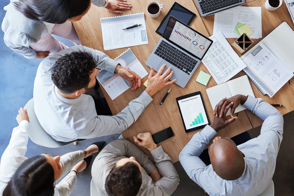 planning and teamwork meeting with business people in meeting in a board room discussing strategy